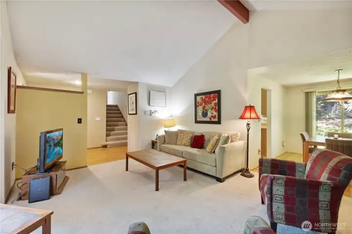 Additional views of front room and dining area.