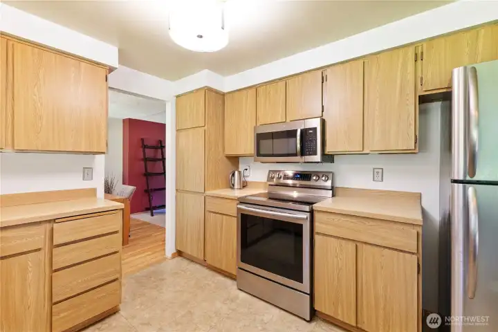 Additional views of all the kitchen cabinets and countertops.