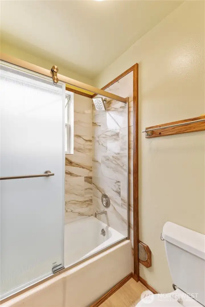 Full bath on lower level, with window