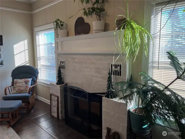 Throughout the house, brand-new laminate flooring has been installed, offering a sleek and durable surface that complements the home's vintage character.