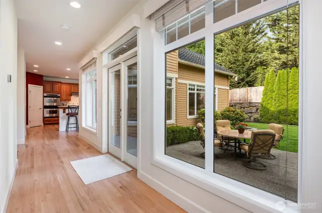 Refinished hardwoods lead to the main floor bedroom or office, and 3/4 bath.