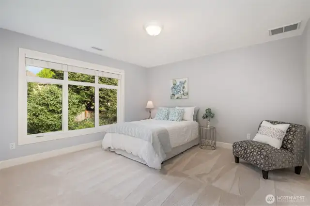 Generously sized guest bedroom 1.