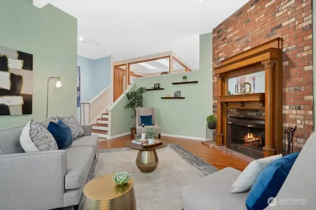 Vaulted ceilings open the space to feel grand and carry that natural light in to the center of the home