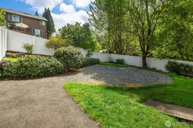 Perfect area for a play structure, trampoline or firepit area.