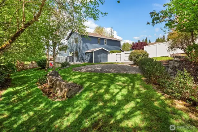 Enjoy the amazing yard. The is also a shed and low maintenance vinyl fencing.