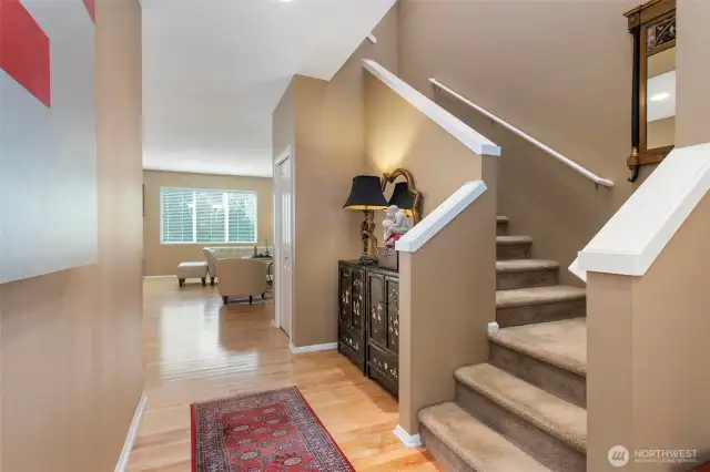Coming in home, stairs going up to 2nd floor with all the bedrooms and utility room