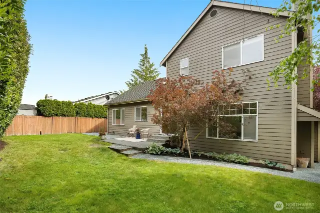 Mature landscapes lends privacy to the entire backyard.