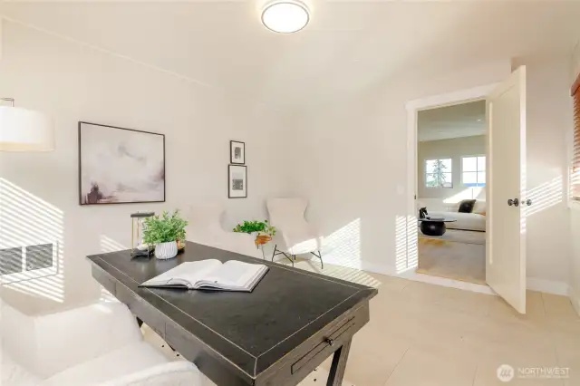 main level large office/den; just off front door, entry room,