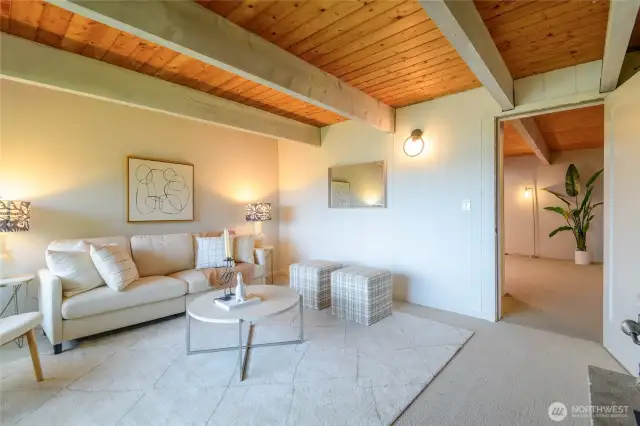 lower daylight level & open beamed ceilings, family rec room has been used as 3rd bedroom...