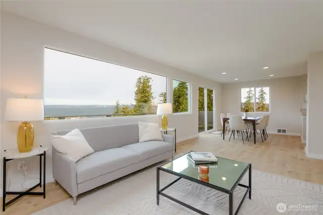 expansive living space views and exterior west side full length private deck