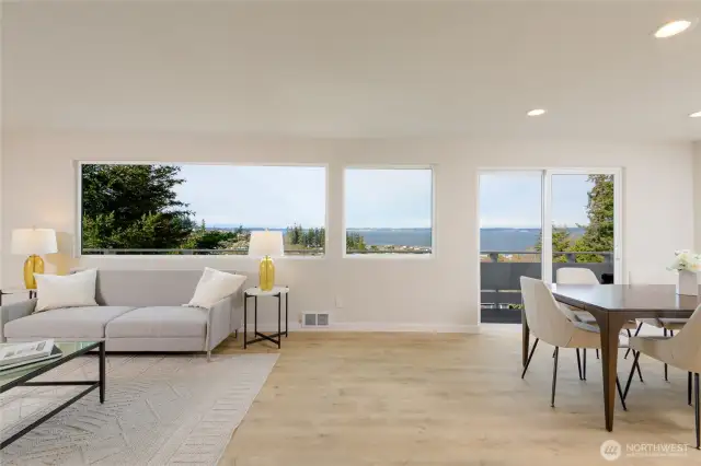 living & dining room spaces, sliding glass door access to deck