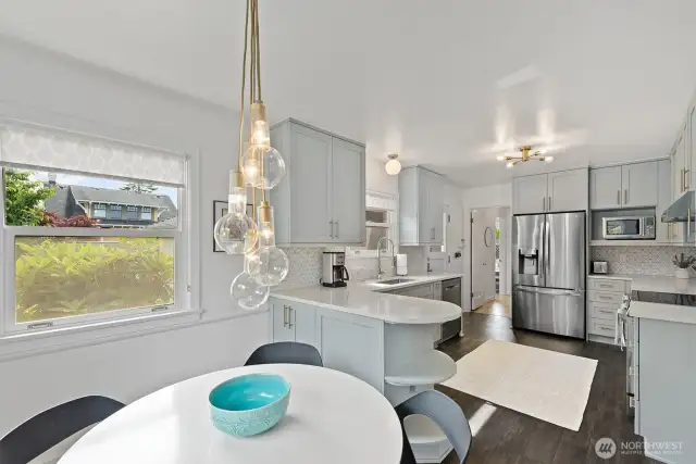 Plenty of cabinet storage throughout with updated, brushed gold light fixtures that add warmth and style.