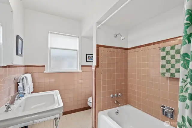 Main floor bathroom a well maintained throwback to the 50's!