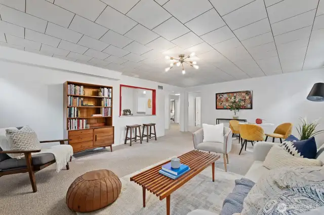Additional view of this spacious room --- leads to two more bedrooms, laundry and storage.