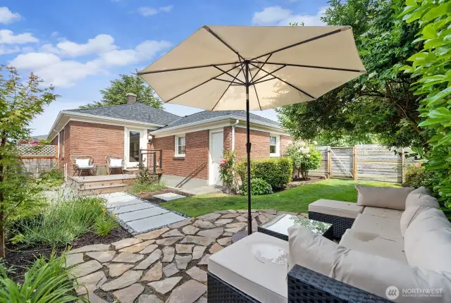 Beautiful flagstone patio in corner of lot. Fully fenced yard for furry friends.