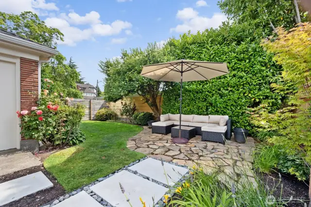 Mature landscaping completes the picture and encourages time to stop and smell the roses!