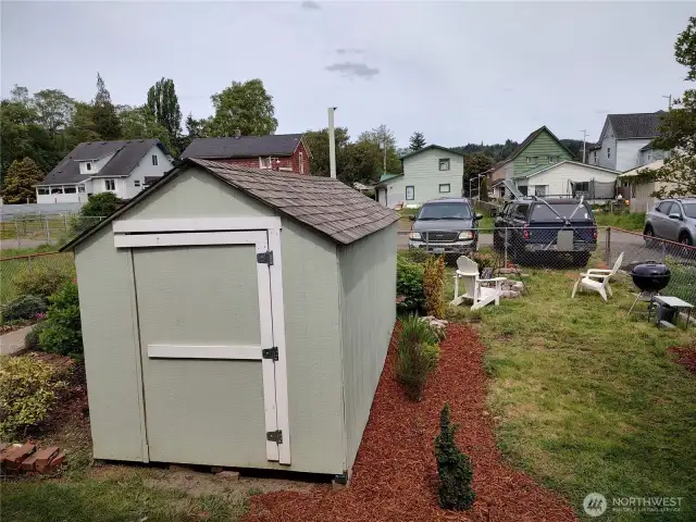 Rear yard triplex with shed
