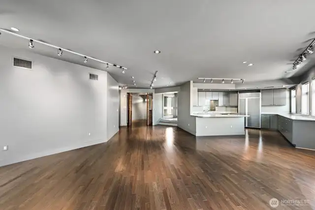 Yes. The living and dining room space is this large. Beautiful Mirage wood floors laid on diagnol for more drama.