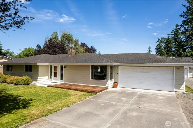 Great street appeal, front deck & 2 car garage with long cement slab for extra parking.