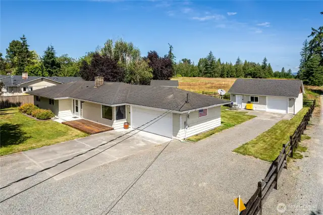 Tons of parking for RV'S, extra vehicles, boats or toys. Flat lot that is a shy 1/2 acre!
