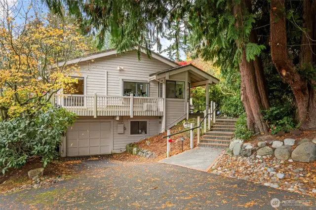 Driveway parking and a large 1 car garage