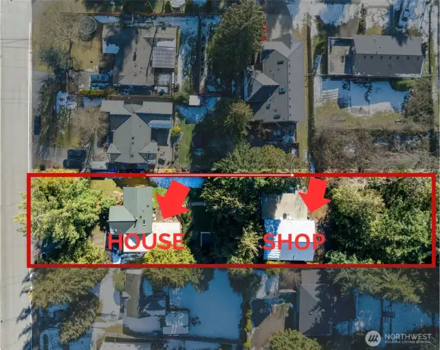 Lot line with arrows showing location of house and shop.