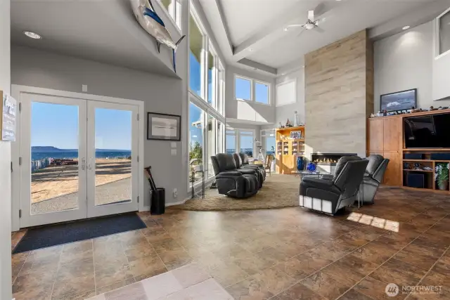 Soaring ceilings and wall to wall windows to welcome you home
