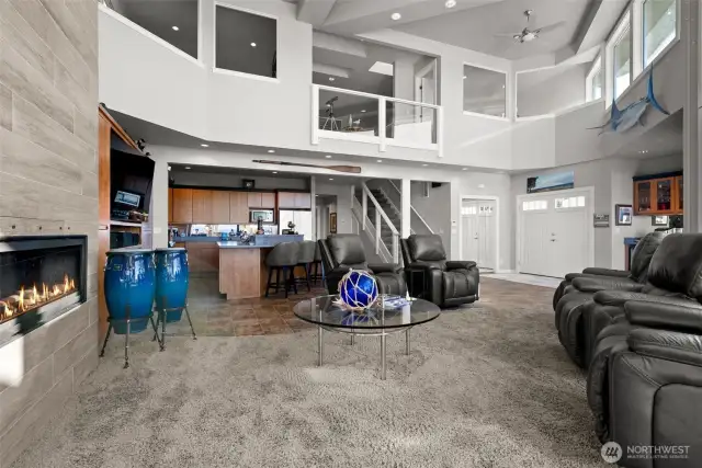 By design, the home strategically placed interior windows on the upper floor- providing more views