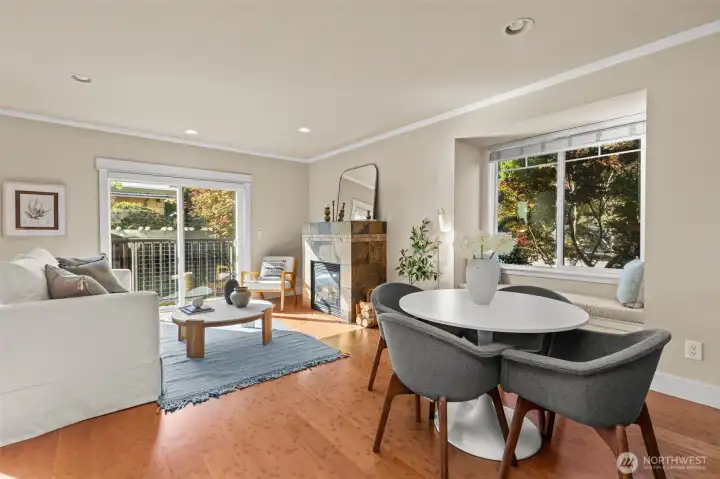 Stylish living and dining area surrounded by greenery