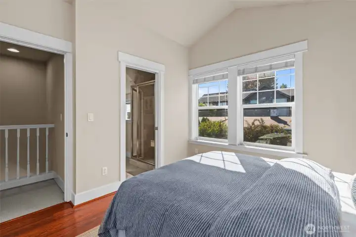 South-facing bedroom with vaulted ceilings and en suite bathroom