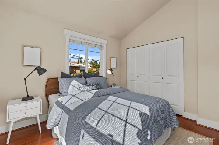 South-facing bedroom with vaulted ceilings and en suite bathroom