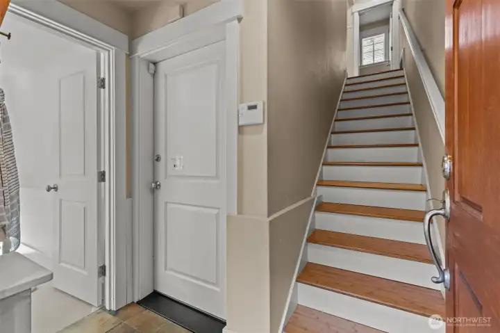 Welcoming entryway with access to garage and bonus room