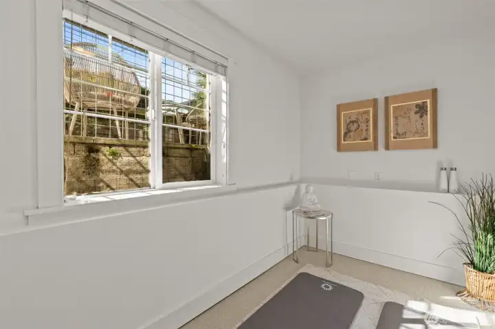 Bright lower-level room perfect for a home gym or office