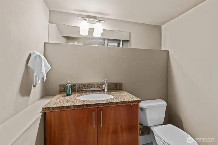 Half-bath tucked in the garage