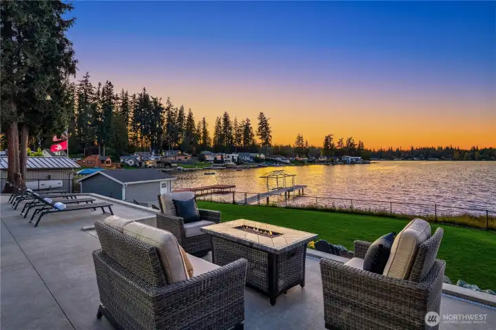 Welcome to luxury living on Lake Goodwin—where resort-style amenities meet refined lakeside elegance.