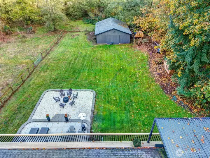 Views of backyard towards barn and chicken coop