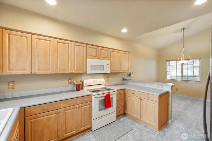 Look at all of the counter space. Bar area, too.