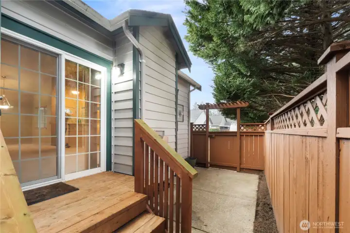 Deck and patio area with access from both the Primary Bedroom & the Living Room