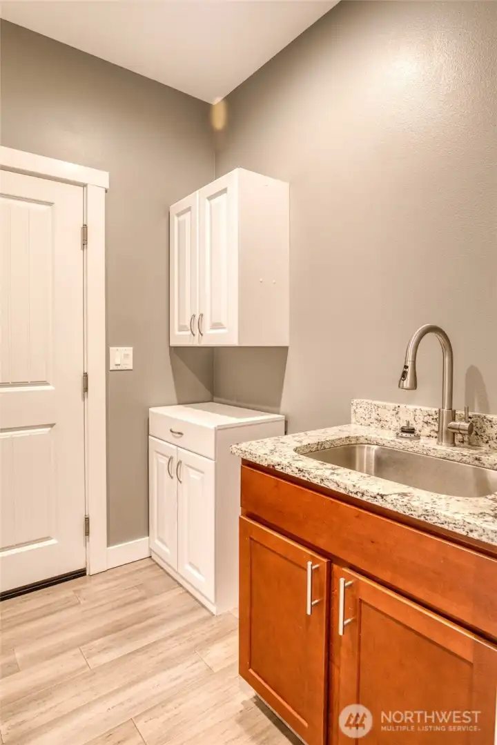 laundry room with built in sink