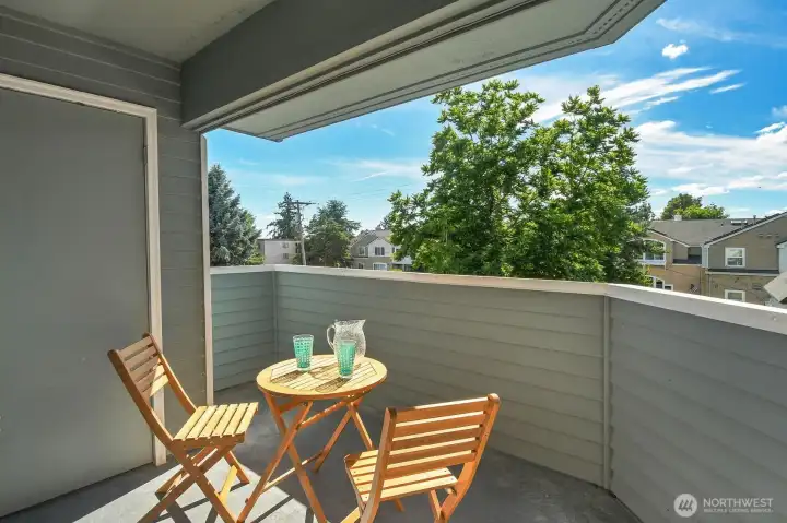The private covered balcony has room for colorful potted plants and outdoor seating. Don't miss the external storage closet (one of two), perfect for storing seasonal items. The private covered balcony has room for colorful potted plants and outdoor seating. Don't miss the external storage closet (one of two), perfect for storing seasonal items.