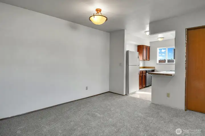 Large dining area adjacent to the kitchen.
