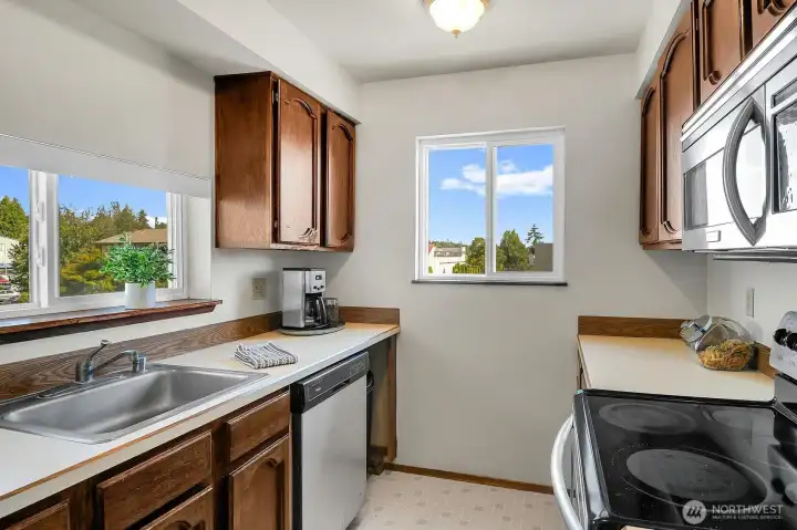 This galley style kitchen has a practical layout with plenty of potential for your personal touches. This galley style kitchen has a practical layout with plenty of potential for your personal touches.