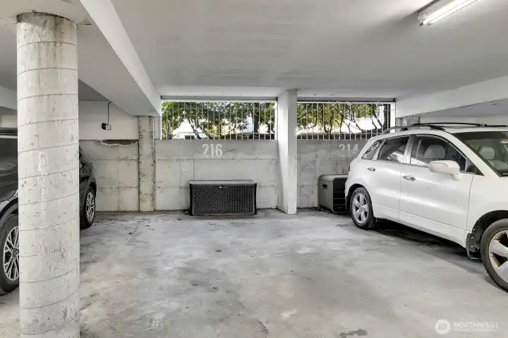 One parking space in controlled access garage with additional parking on surface lot.