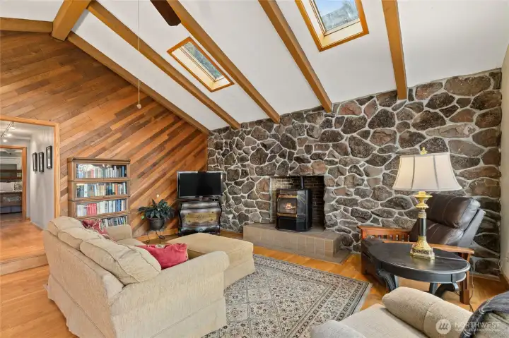 Oak floors and custom stone wall for a cozy cabin feel