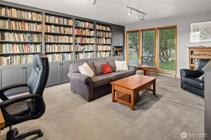 Flex room office/library with separate entrance to the backyard.