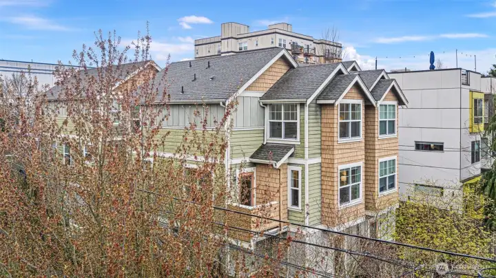 Lightly lived in and beautifully maintained, this 2005 Craftsman-style home sits proudly on a corner lot just steps from the entrance to Licton Springs Park.