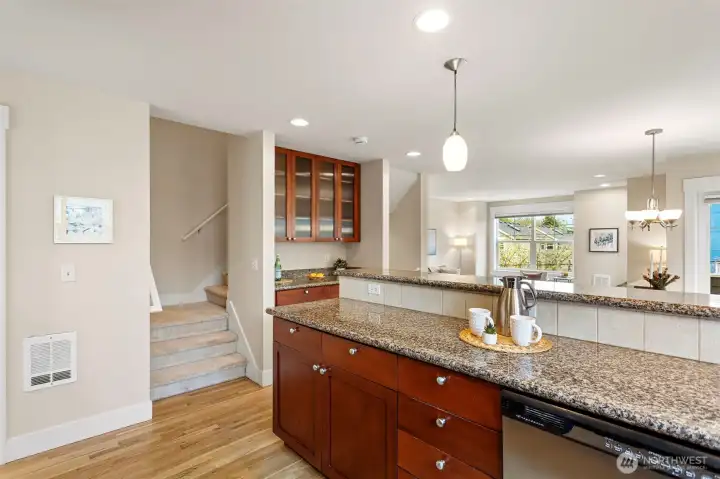 A buffet off the kitchen is perfect to set up your coffee machine, a bar or a serving buffet off the dining area. Lots of extra storage with glass front cabinets.