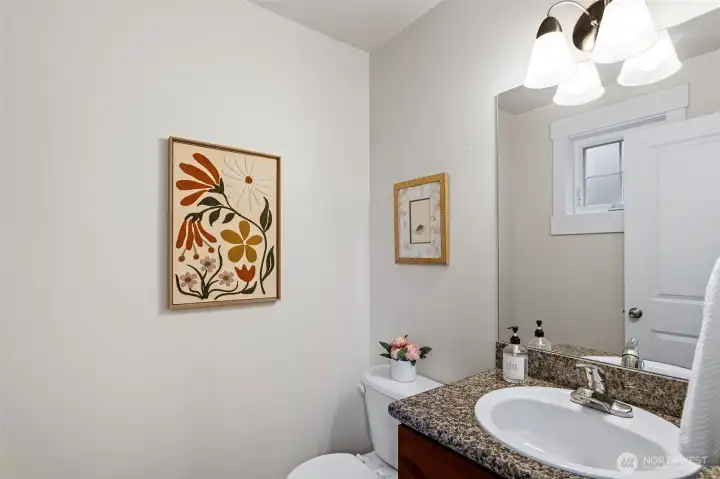 A convenient powder room completes the main floor.