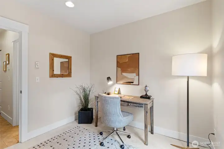 On the entry level, you’ll find access to the attached garage, an additional powder room, and a third bedroom with direct access to the fully enclosed backyard.