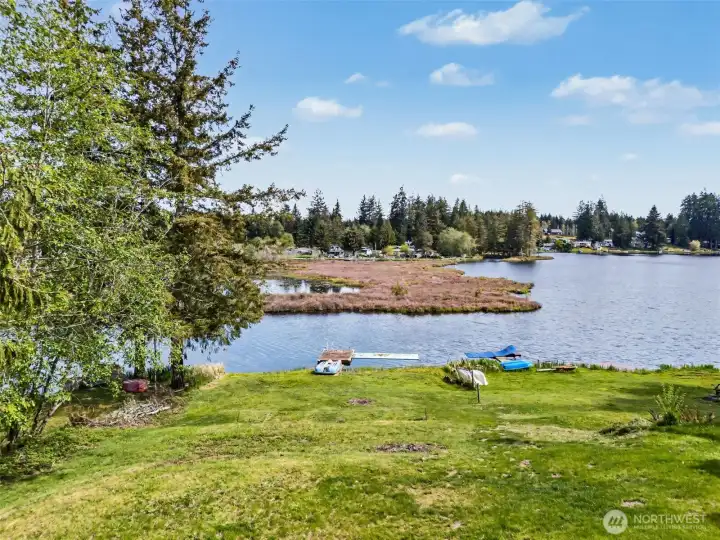 Expansive lake view with private shoreline and dock potential